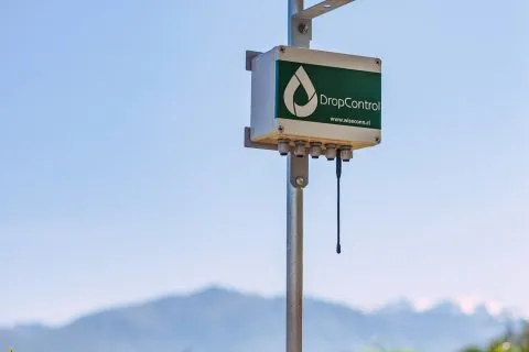 Close-up of Irrigation Timer hardware installed in the field for drop control, showing precise management of water distribution and automated irrigation.